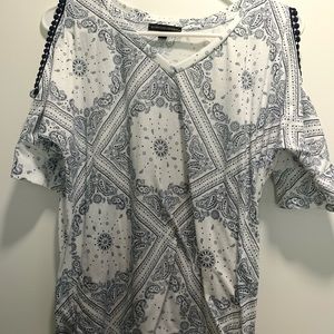 Shirt with open shoulder